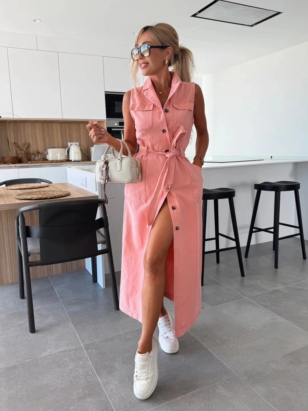 Effen denimjurk met knoopzak